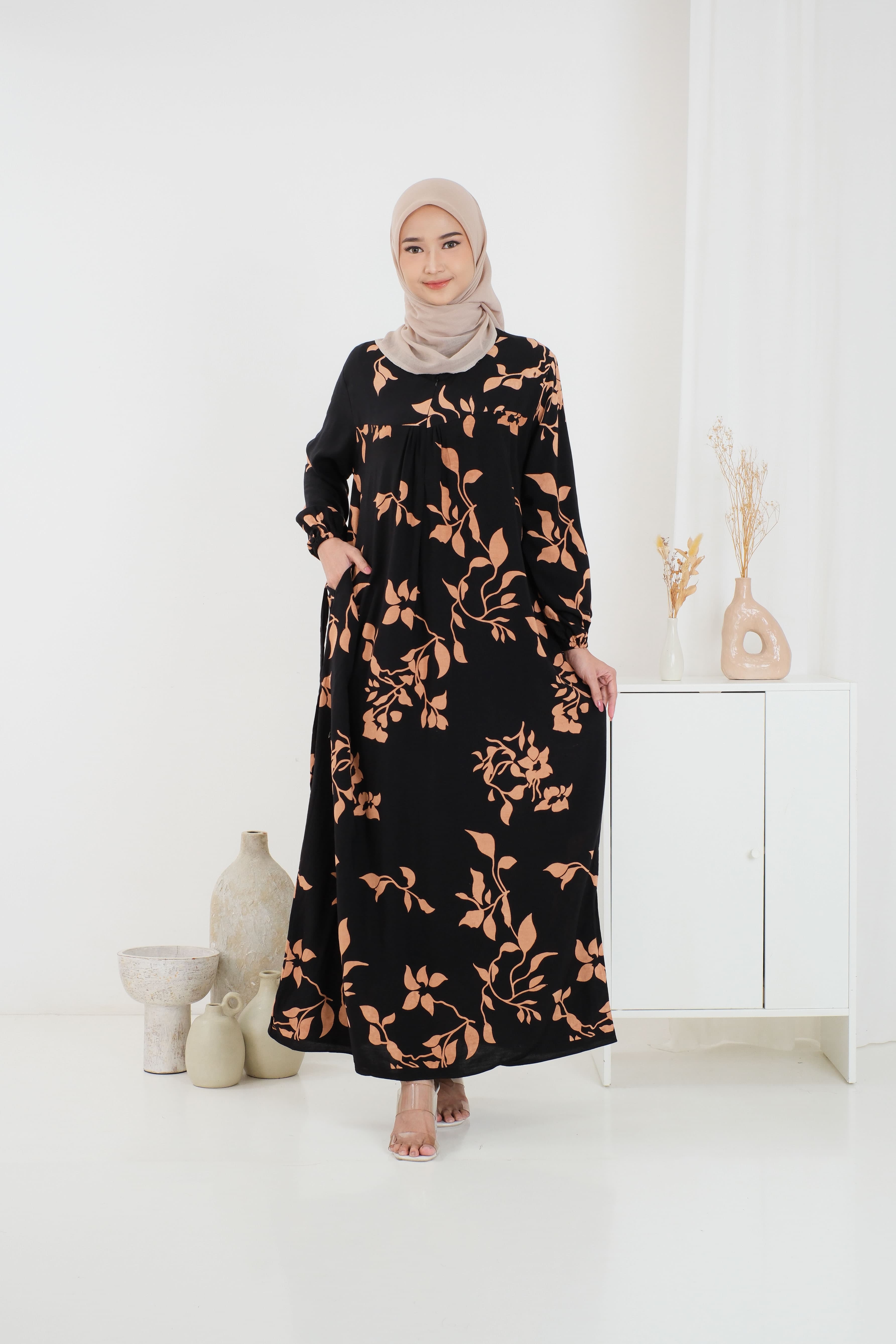 Woman wearing premium rayon black floral longdress